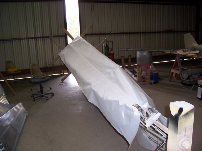 Fuselage fabric going on
