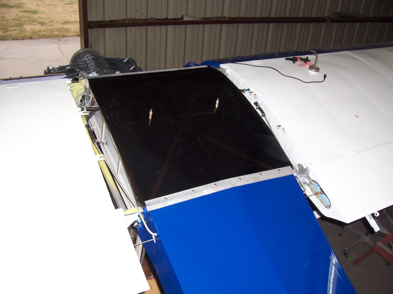 Skylight fitted and front and rear trims fabricated